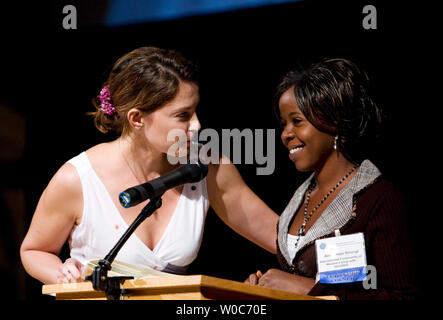 Actress and Global YouthAIDS ambassador Ashley Judd and Birungi Alice Hope, a member of the Internal Community of Women Living with HIV/AIDS, speak during the BREAKTHROUGH: The Women, Faith, and Development Summit to End Global Poverty at the Washington National Cathedral in Washington on April 13, 2008. (UPI Photo/Patrick D. McDermott) Stock Photo