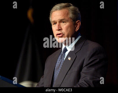 President George W. Bush outlines plans to help curb the proliferation of weapons of mass destruction during a speech at Fort Lesley J. McNair National Defense University in Washington on February 11, 2004.    (UPI Photo/Roger L. Wollenberg) Stock Photo