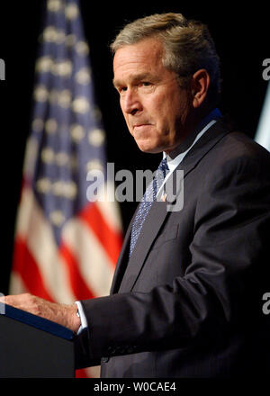 President George W. Bush outlines plans to help curb the proliferation of weapons of mass destruction during a speech at Fort Lesley J. McNair National Defense University in Washington on February 11, 2004.    (UPI Photo/Roger L. Wollenberg) Stock Photo