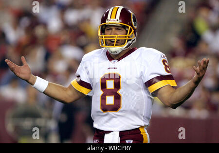 Washington Redskins quarterback Mark Burnell is sacked by the Dallas  Cowboys at FedEx Field in Landover, Md., on Sept. 27, 2004. The Cowboys led  the Redskins 7-3 at the half. (UPI Photo/Roger