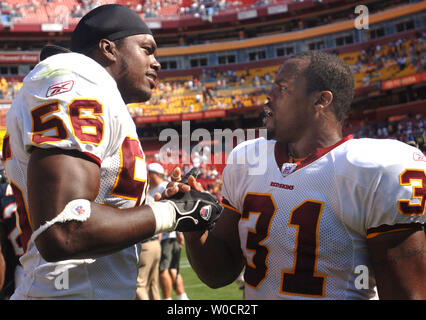 The Washington Redskins LaVar Arrington (56) comes in to make the tackle on  Kevan Barlow (32) of the San Francisco 49ers in the third quarter on  October 23, 2005 in a game