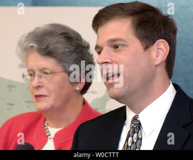 Director of the Engineering Institute Steve Batzer (R) and Joan Claybrook president of Public Citizen speak about the new National Highway Traffic Safety Administration (NHTSA) new roof strength standards, in regards to roll over accidents, calling them inadequate and weak, in Washington on November, 21 2005. Rollover crashes constitute only three percent of total vehicle crashes, yet they are responsible for one-third of all crash fatalities. (UPI Photo/Kevin Dietsch) Stock Photo