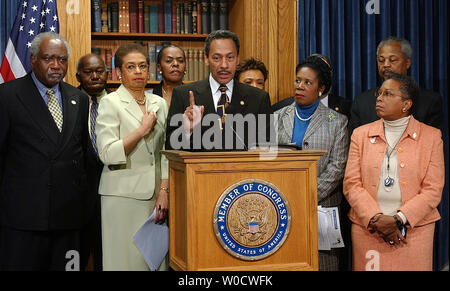 Congressional Black Caucus chairman Rep. Melvin Watt, D-N.C., backed by members of the caucus, voices the group's opposition to Supreme Court Justice nominee Samuel Alito during a news conference on Capitol Hill in Washington on December 8, 2005.   (UPI Photo/Roger L. Wollenberg) Stock Photo