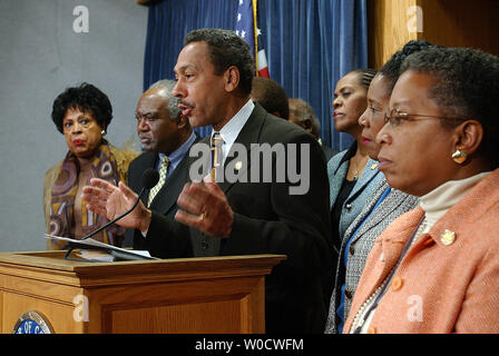 Congressional Black Caucus chairman Rep. Melvin Watt, D-N.C., backed by members of the caucus, voices the group's opposition to Supreme Court Justice nominee Samuel Alito during a news conference on Capitol Hill in Washington on December 8, 2005.   (UPI Photo/Roger L. Wollenberg) Stock Photo