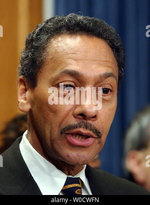 Congressional Black Caucus chairman Rep. Melvin Watt, D-N.C., backed by members of the caucus, voices the group's opposition to Supreme Court Justice nominee Samuel Alito during a news conference on Capitol Hill in Washington on December 8, 2005.   (UPI Photo/Roger L. Wollenberg) Stock Photo