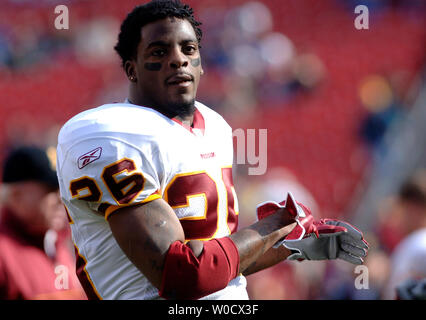 Washington Redskins Clinton Portis (26) breaks the tackle of New York Jets  Victor Hobson (54) in the first quarter at Giants Stadium in East  Rutherford, New Jersey on November 4, 2007. The