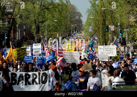 Tens of thousands of immigrants and their supporters march down 16th Street to the National Mall during a rally in Washington on April 10, 2006. Across the U.S. hundreds of thousands of protestors rallied today against a House bill that would criminalize illegal immigrants and for reform measures that would protect their rights.  (UPI Photo/Chris Rossi) Stock Photo