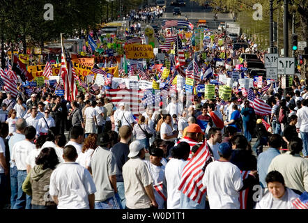 Tens of thousands of immigrants and their supporters march during a rally in Washington on April 10, 2006. Across the U.S. hundreds of thousands of protestors rallied today against a House bill that would criminalize illegal immigrants and for reform measures that would protect their rights.  (UPI Photo/Chris Rossi) Stock Photo