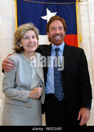 Sen. Kay Baily Hutchison (R-TX) meets with  actor Chuck Norris to discuss the Kick Start program, on Capitol Hill in Washington on May 10, 2006. The Kick Start program is a youth character development program that aims to keep kids off drugs, out of gangs and builds their self confidence through martial arts. (UPI  Photo/Kevin Dietsch) Stock Photo