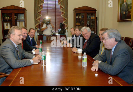Speaker of the House Dennis Hastert (R-IL)  (center right) and other members of the house meet with the CEO's of the countries top automotive companies, including Chrysler CEO Tom LaSorda, (front left), CEO of General Motors Rick Wagoner (center left) and CEO of Ford Motors William Ford, in Washington on May 18, 2006.  (UPI Photo/Kevin Dietsch) Stock Photo