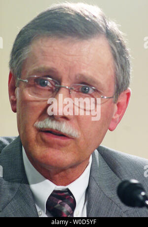 International UAW President Ron Gettelfinger talks with reporters at ...