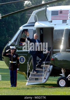 President Bush waves as he departs the White House in Washington ...