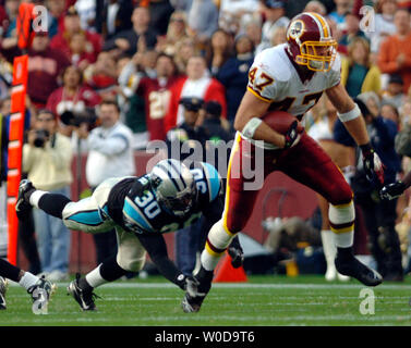 Tampa Bay Buccaneers safety Jermaine Phillips (23) celebrates after  tackling Washington Redskins tight end Chris Cooley (47). The Buccaneers  defeated the Redskins 19-13, at Raymond James Stadium in Tampa, Florida,  Sunday, November