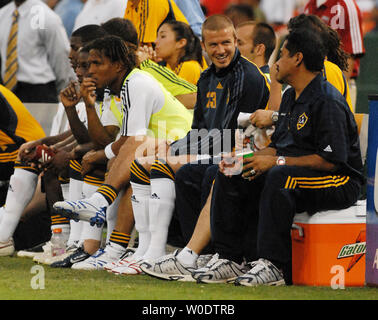 LA Galaxy's David Beckham (C) sits with teammates on the bench during a game against the DC United at RFK Stadium in Washington on August 9, 2007.  (UPI Photo/Alexis C. Glenn) Stock Photo