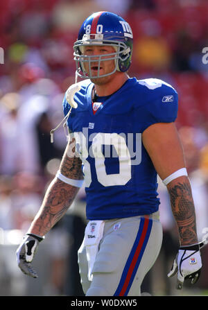 New York Giants Jeremy Shockey puts his head down while in the