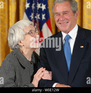 U.S. President George W. Bush awards the Presidential Medal of Freedom to Harper Lee, author of 'To Kill a Mockingbird,' in the East Room of the White House in Washington on November 5, 2007.   (UPI Photo/Roger L. Wollenberg) Stock Photo