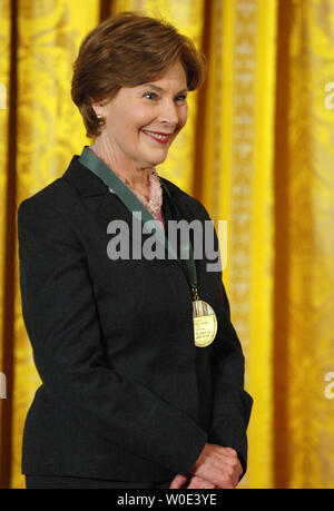 First Lady Laura Bush waits to present the 2007 National Medals for Museum and Library Service during a ceremony in the East Room of the White House in Washington on January 11, 2008. Mrs. Bush was also given one of the medals for her support of libraries and museums.  (UPI Photo/Roger L. Wollenberg) Stock Photo