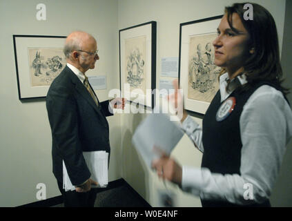 Exhibit Coordinator Jennifer Nicholes (R) speaks alongside Archivist of the United States Allen Weinstein at a media preview for The National Archives new exhibit 'Running for Office: Candidates, Campaigns, and the Cartoons of Clifford Berryman' in Washington on January 31, 2008. The exhibit, which is set to open on February 8, features the work of political cartoonist Clifford K. Berryman spanning the years 1898-1949. Most of the work appeared in the pages of either the Washington Post or Washington Star. (UPI Photo/Kevin Dietsch) Stock Photo