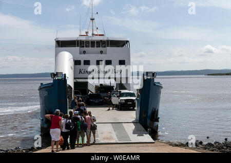 Foot passengers boarding the Kingfisher Bay car ferry at River Heads south of Hervey Bay for Fraser Island in Queensland, Australia. Stock Photo