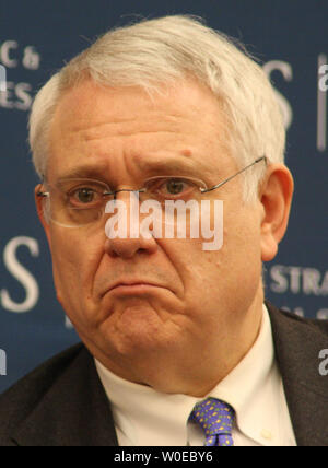 John Hamre, President and CEO of the Center for Strategic and International Studies, looks on as Sen. Chuck Hagel (R-NE) presents his book, 'America: Our Next Chapter: Tough Questions, Straight Answers,' in Washington on June 18, 2008. (UPI Photo/Jack Hohman) Stock Photo