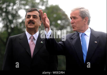 U.S. President George W. Bush (R) delivers remarks alongside the Prime Minister of Pakistan Syed Yousuf Raza Gilani following their meeting on the South Lawn of the White House in Washington on July 28, 2008. (UPI Photo/Kevin Dietsch) Stock Photo