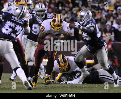 FedEx Field, Landover, Maryland. .Washington Redskins ''hog'' in game  action during NFL prime-time Sunday night football between the Dallas  Cowboys and Washington Redskins. This being the last home game of the season