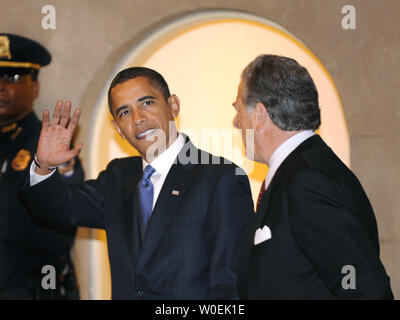 President Barack Obama waves as he leaves the White House in Washington ...