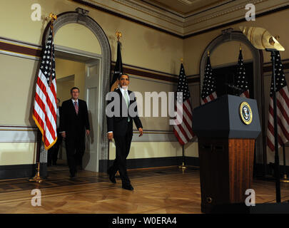 U.S. President Barack Obama arrives to urge passage of the budget during a statement in the Eisenhower Executive Office Building adjacent to the White House in Washington on March 17, 2009. Following him are Sen. Kent Conrad, D-ND, and Rep. John M. Spratt, Jr., D-SC.    (UPI Photo/Roger L. Wollenberg) Stock Photo