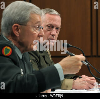 Gen. Bantz J. Craddock- commander, U.S. European Command, and supreme allied commander for Europe, NATO (L); and Gen. James N. Matis- commander, U.S. Joint Forces Command, and supreme allied commander for transformation, NATO testify before the Senate Armed Services Committee on the status of U.S. military commands on Capitol Hill in Washington on March 24, 2009.   (UPI Photo/Roger L. Wollenberg) Stock Photo