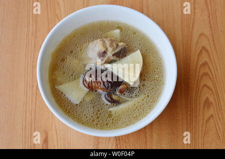 boiled Chinese bamboo shoot with pork bone soup Stock Photo