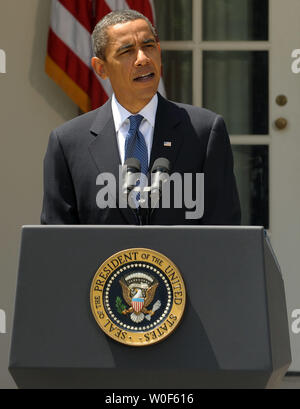 U.S. President Barack Obama discusses the economy in the Rose Garden of the White House on August 7, 2009. Obama noted the unemployment rate for July declined to 9.4 percent from 9.5 percent in June, a sign that economic losses are slowing.   UPI Photo/Roger L. Wollenberg Stock Photo