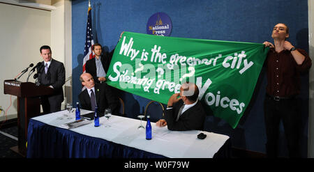 Pittsburgh Mayor Luke Ravenstahl, Allegheny Conference on Community Development Dennis Yablonsky and Allegheny County Executive Dan Onorato (L to R) are interrupted by protestors during a news conference to discuss the G20 summit which Pittsburgh is hosting in Washington on September 9, 2009. The protestors are representative of a myriad of groups which wish to protest the G20 summit but feel they are being kept too far from the summit venue.   UPI/Roger L. Wollenberg Stock Photo