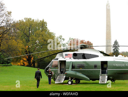 President Barack Obama walks across the South Lawn to Marine One helicopter to depart the White House, November 1, 2009, in Washington.  Obama is on a day-trip to Camden and Newark, New Jersey to campaign for Democratic Governor Jon Corzine, who is in a tough re-election battle with his Republican opponent.       ( UPI Photo/Mike Theiler) Stock Photo