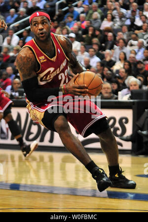 Cleveland Cavaliers' LeBron James drives to the basket against the Washington Wizards at the Verizon Center in Washington on November 18, 2009. UPI/Kevin Dietsch Stock Photo