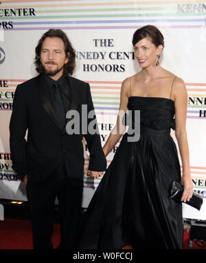 Eddie Vedder and his wife Jill McCormick arrive on the red carpet of the Kennedy Center Honors in Washington on December 6, 2009. UPI/Alexis C. Glenn Stock Photo