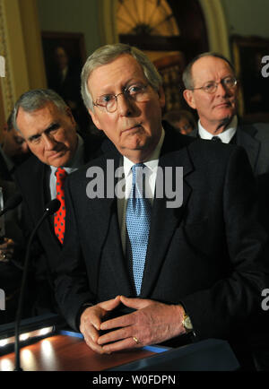 Senate Minority Leader Mitch McConnell (R-KY) (C) speaks on the upcoming health care vote in Washington on December 22, 2009. McConnell was joined by Sen. Jon Kyl (R-AZ) (L) and Sen. Lamar Alexander (R-TN).  UPI/Kevin Dietsch Stock Photo