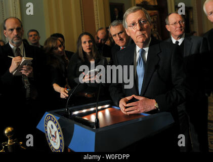 Senate Minority Leader Mitch McConnell (R-KY) (C) speaks on the upcoming health care vote in Washington on December 22, 2009. McConnell was joined by Sen. Jon Kyl (R-AZ) (L) and Sen. Lamar Alexander (R-TN).  UPI/Kevin Dietsch Stock Photo