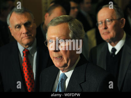 Senate Minority Leader Mitch McConnell (R-KY) (C) speaks on the upcoming health care vote in Washington on December 22, 2009. McConnell was joined by Sen. Jon Kyl (R-AZ) (L) and Sen. Lamar Alexander (R-TN).  UPI/Kevin Dietsch Stock Photo