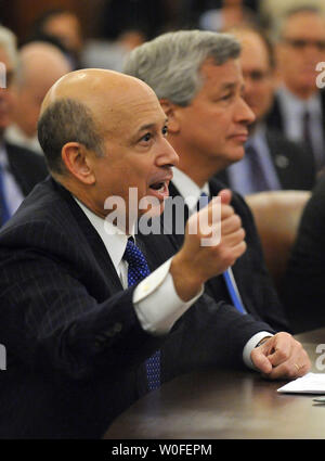 Goldman Sachs Group Chairman and CEO Lloyd Blankfein (L) testifies alongside JP Morgan Chase Chairman and CEO James Dimon on the causes of the economic crisis before the Financial Crisis Inquiry Commission in Washington January 13, 2010.   UPI/Kevin Dietsch Stock Photo
