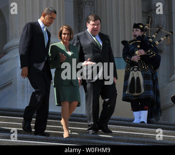 U.S. President Barack Obama (L), Irish Prime Minister Brian Cowen (R) and Speaker of the House Nancy Pelosi (D-CA) leave the U.S. Capitol Building after a St. Patrick's Day Luncheon, in Washington on March 17, 2010.  UPI/Kevin Dietsch Stock Photo