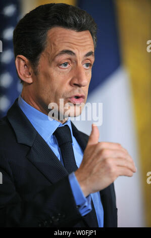 French President Nicolas Sarkozy speaks during a joint press conference with U.S. President Barack Obama at the White House in Washington March 30, 2010.  UPI/Kevin Dietsch Stock Photo