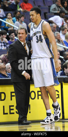 Washington Wizards head coach Flip Sauners (L) speaks with player JaVale McGee as they play against the Chicago Bulls during the second quarter at the Verizon Center in Washington on April 2, 2010. UPI/Alexis C. Glenn Stock Photo