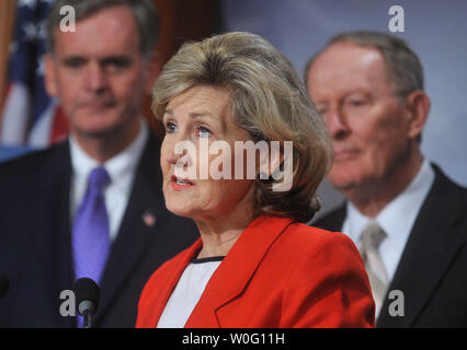 Sen. Kay Bailey Hutchison (R-TX) , joined by Sen. Judd Gregg (R-NH) (L) and Sen. Lamar Alexander (R-TN), speaks at a press conference on the Sessions-McCaskill spending freeze bill, on Capitol Hill in Washington on September 16, 2010.   UPI/Kevin Dietsch Stock Photo