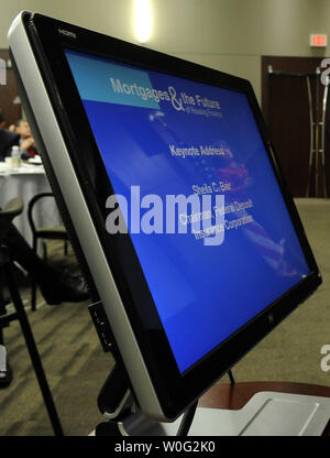 FDIC Chair Sheila Bair is reflected in a monitor as she speaks during a Federal Deposit Insurance Corporation (FDIC) Symposium on 'Mortgages and the Future of Housing Finance' in Arlington, Virginia, on October 25, 2010.     UPI/Roger L. Wollenberg Stock Photo
