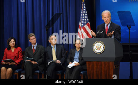 Vice President Joe Biden speaks during a Middle Class Task Force event in the Eisenhower Executive Office Building to announce a series of federal actions designed to lay the groundwork for a strong, self-sustaining home energy efficiency retrofit industry in Washington on November 9, 2010. From left are Secretary of Labor Hilda Solis, Secretary of Housing and Urban Development Shaun Donovan, Secretary of Energy Steven Chu and Chair of the Council on Environmental Quality Nancy Sutley.   UPI/Roger L. Wollenberg Stock Photo