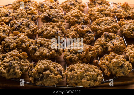 chocolate chip cookies cooling on wire rack Stock Photo