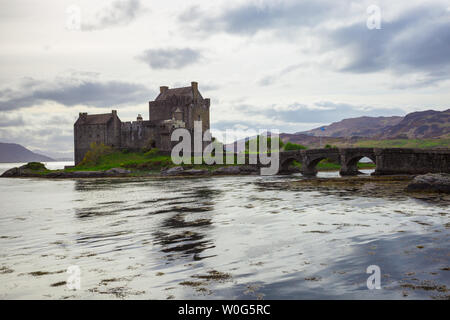 Highlands Scotland landmark Eilean Donan Castle in Dornie, hiking adventure vacation in Europe, Scottish castle Stock Photo