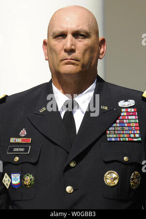 Gen. Raymond Odierno listens to remarks by U.S. President Barack Obama as he is nominated to be the next Army Chief of Staff, May 30, 2011 in the Rose Garden of the White House, in Washington, D.C.   UPI/Mike Theiler Stock Photo