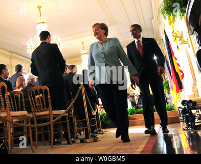 President Barack Obama and German Chancellor Angela Merkel leaves the East Room following a joint press conference at the White House in Washington on June 7, 2011.  UPI/Kevin Dietsch Stock Photo