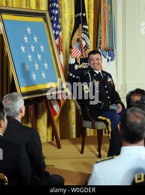 Medal of Honor recipients Army Sgt. 1st Class Leroy Arthur Petry, left, and  Marine Corps Sgt.